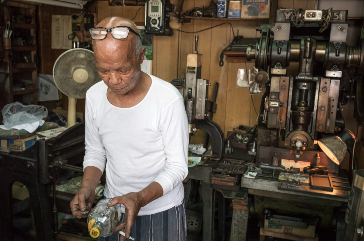 An octogenarian in his dated little Tokyo workshop