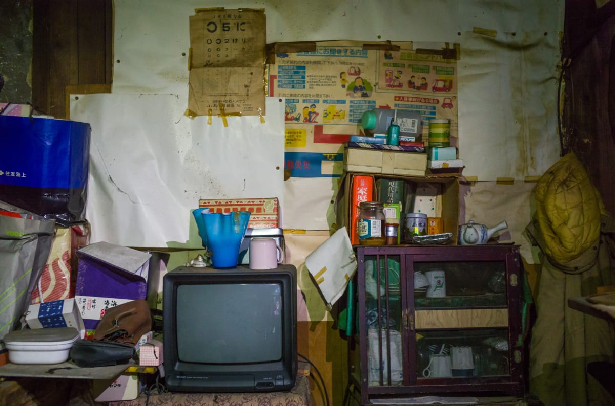 The overgrown beauty of a long abandoned Japanese shopping arcade