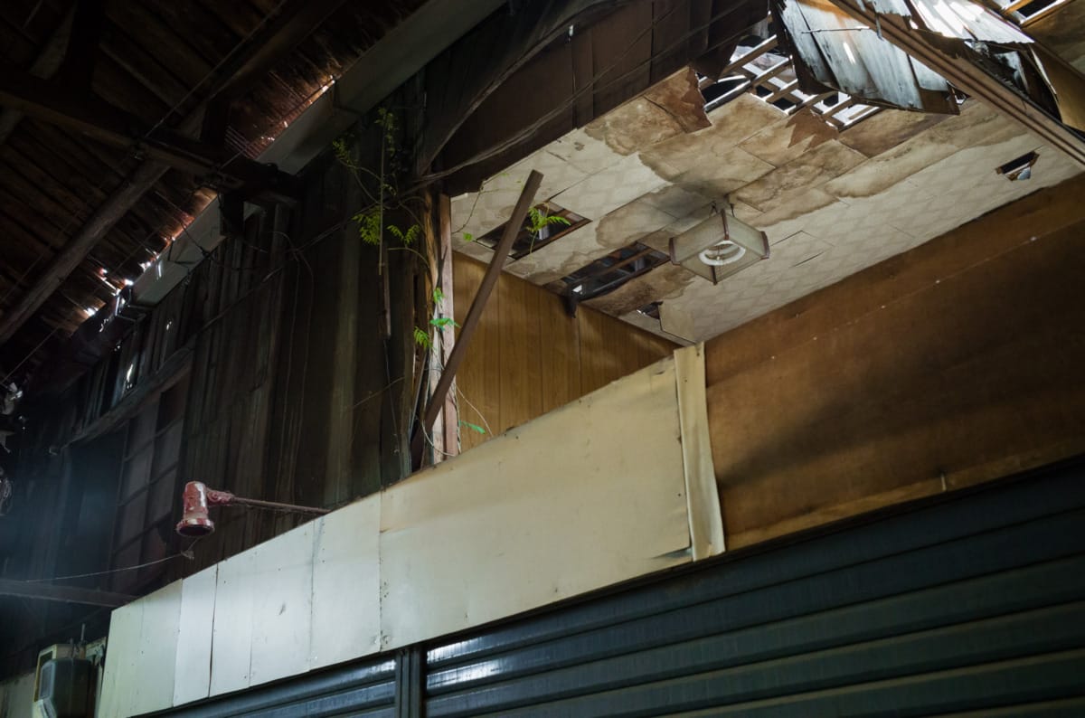 dilapidated pre-war and wooden Japanese shopping street