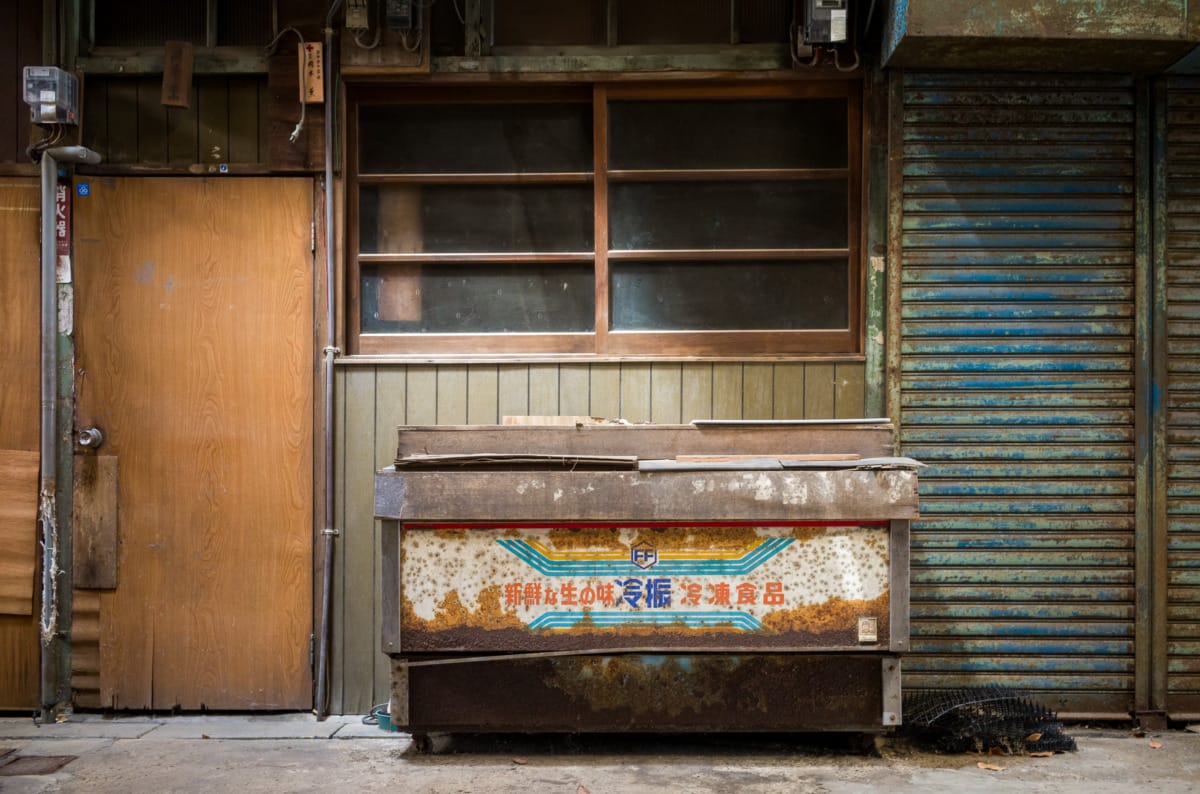 The last shop and dated signs of an old Japanese shopping arcade